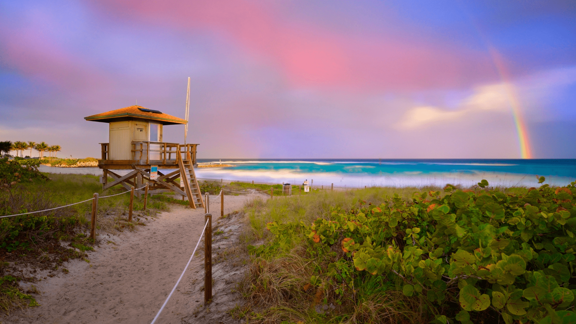 Beautiful Sunset with rainbow at Boca Raton beach, Florida